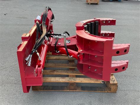 skid steer attachments auction